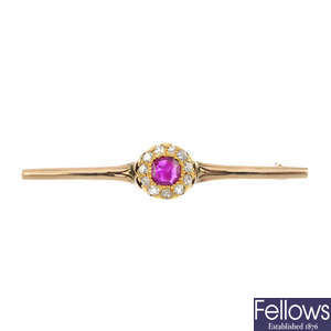 A mid 20th century gold ruby and diamond cluster bar brooch.