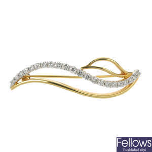 An 18ct gold diamond stylised leaf brooch.