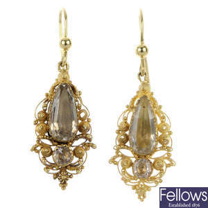 A pair of foil-back quartz ear pendants.