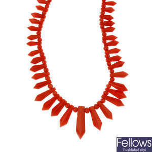 A coral fringe necklace.