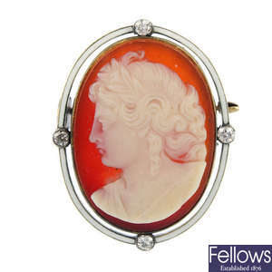 An early 20th century gold diamond and enamel cameo brooch.