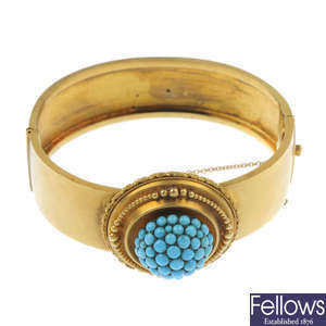 A late 19th century gold turquoise bangle.
