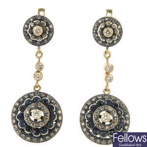 A pair of diamond and sapphire ear pendants.