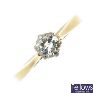 A diamond single-stone ring.