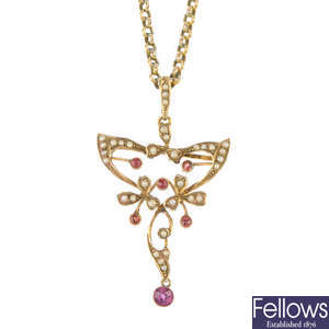 An early 20th century 9ct gold garnet and split pearl pendant.