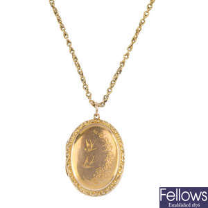 An early 20th century locket and 9ct gold chain. 