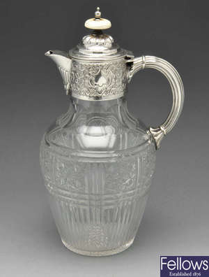 A late Victorian silver mounted claret jug.
