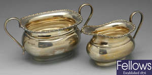 A 1950's silver sugar bowl & matching cream jug. (2).