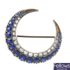 A late 19th century gold and silver sapphire and diamond crescent brooch.