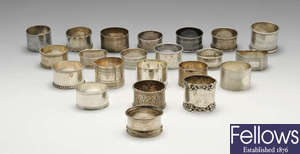 A selection of twenty Edwardian and later silver napkin rings.