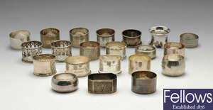 A selection of twenty Victorian and later silver napkin rings.