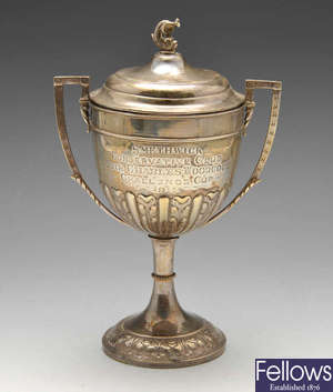 An Edwardian trophy cup and cover.
