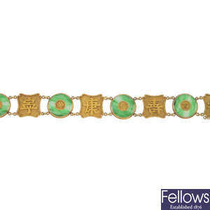 An early 20th century gold jade bracelet.