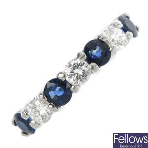 An 18ct gold sapphire and diamond seven-stone ring.