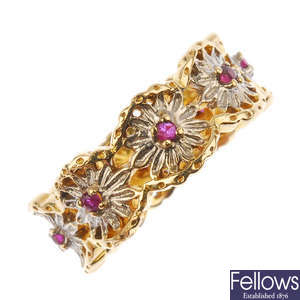 A 14ct gold ruby floral full-circle eternity ring.