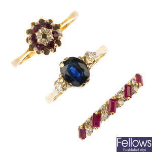 A selection of three 18ct gold diamond and gem-set rings.