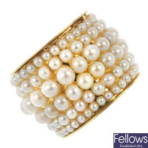A cultured and seed pearl six-row full-circle eternity ring.