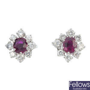 A pair of ruby and diamond cluster ear studs.