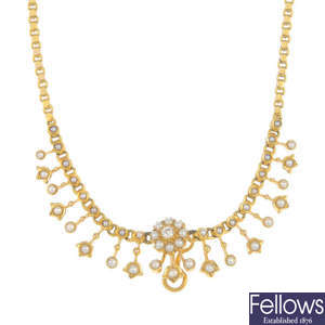 An early 20th century 15ct gold diamond and split pearl necklace.