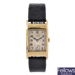 PRESTEX - a gentleman's 9ct yellow gold wrist watch.