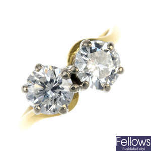 An 18ct gold laser drilled diamond two-stone ring.