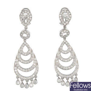 A pair of 18ct gold diamond ear pendants.