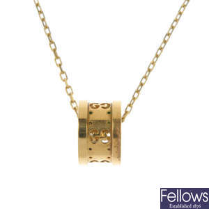 GUCCI - an 18ct gold 'Icon' pendant.