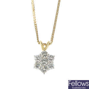An 18ct gold diamond floral cluster pendant and chain.