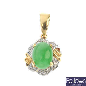 A jade and diamond pendant.