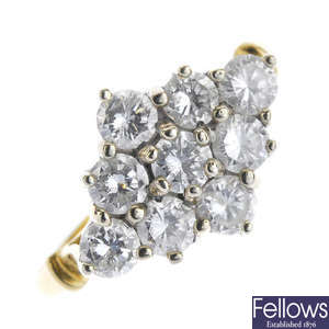 A gold diamond cluster ring.