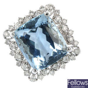 An aquamarine and diamond cluster ring. 