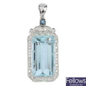 An aquamarine and diamond pendant.