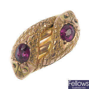 An early 20th century 9ct gold garnet snake ring.