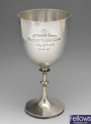 A Victorian silver trophy goblet & a smaller example. (2).