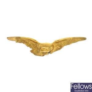 An eagle brooch.