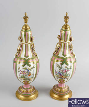A pair of 19th century Continental porcelain urns