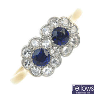 A mid 20th century 18ct gold and platinum sapphire and diamond double cluster ring.