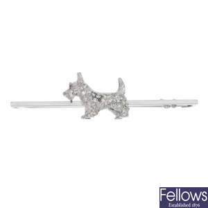 A mid 20th century 15ct gold diamond and ruby Scottie dog bar brooch.