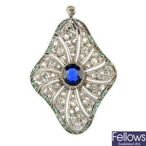 A sapphire, diamond and emerald pendant.