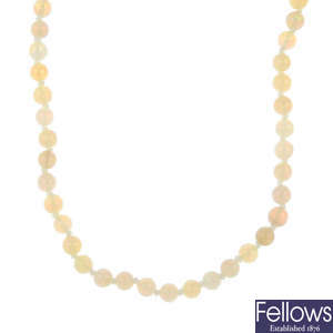 An opal bead single-strand necklace.