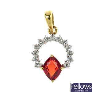 A sapphire and diamond set pendant.
