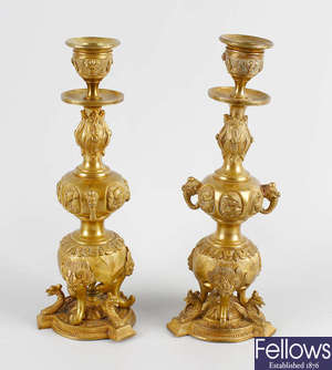 A pair of 19th century Chinese gilt bronze candlesticks