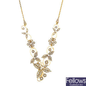 An early 20th century 15ct gold split and seed pearl necklace.