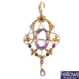 An early 20th century 9ct gold amethyst and split pearl pendant. 