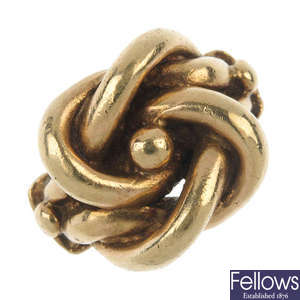 A 9ct gold stylised knot ring.