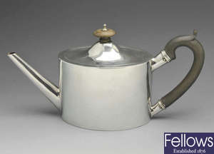 A George III small silver teapot.
