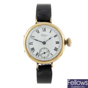 A group of four assorted wrist watches, to include 9ct gold examples.