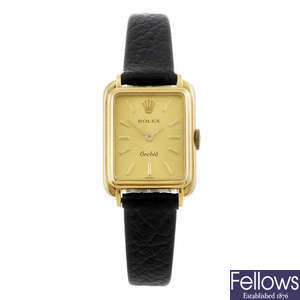 ROLEX - a lady's 18ct yellow gold Orchid wrist watch.