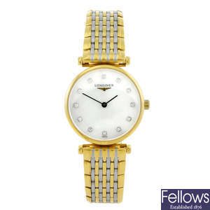 LONGINES - a lady's gold plated La Grande Classique bracelet watch.
