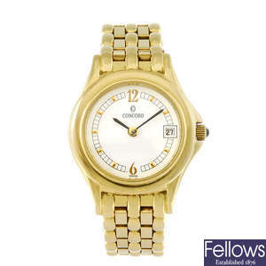 CONCORD - a lady's 18ct yellow gold bracelet watch.